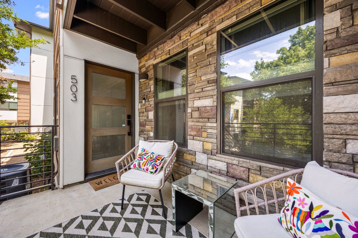 3700 Clawson Road, Unit 503 Austin, TX 78704 - Photo 2 of 39 a balcony with couple of chairs and a couch