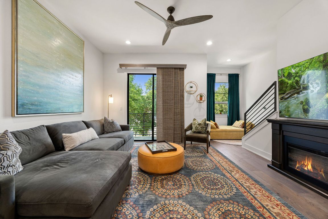 3700 Clawson Road, Unit 503 Austin, TX 78704 - Photo 3 of 39 a living room with furniture and a fireplace