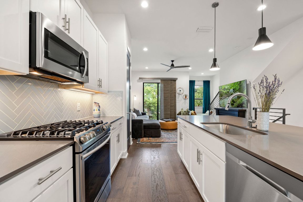 3700 Clawson Road, Unit 503 Austin, TX 78704 - Photo 9 of 39 a kitchen with a sink and steel appliances