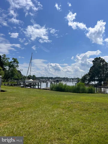a view of a lake with a big yard