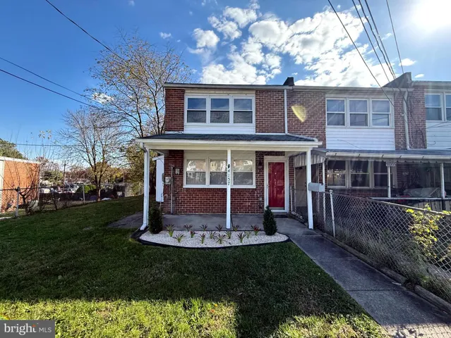 a view of house with yard and entertaining space