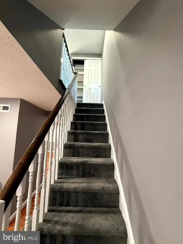 a view of hallway with windows