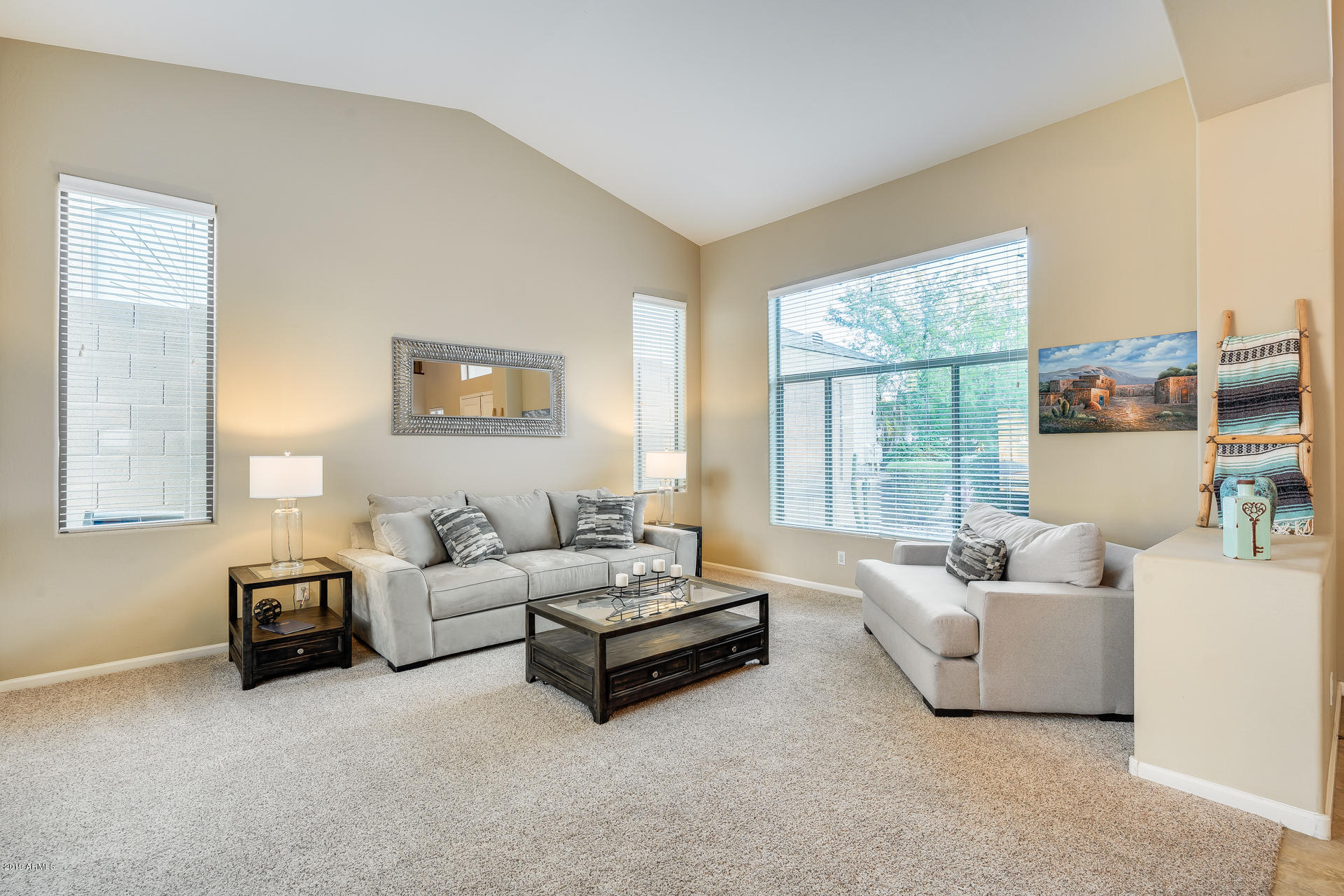 2028 West Caleb Road Phoenix, AZ 85085 - Photo 10 of 57 a living room with furniture and a window
