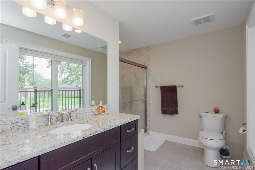 2 Bishop Road, Unit 201 West Hartford, CT 06119 - Photo 20 of 26 Primary bedroom en-suite.