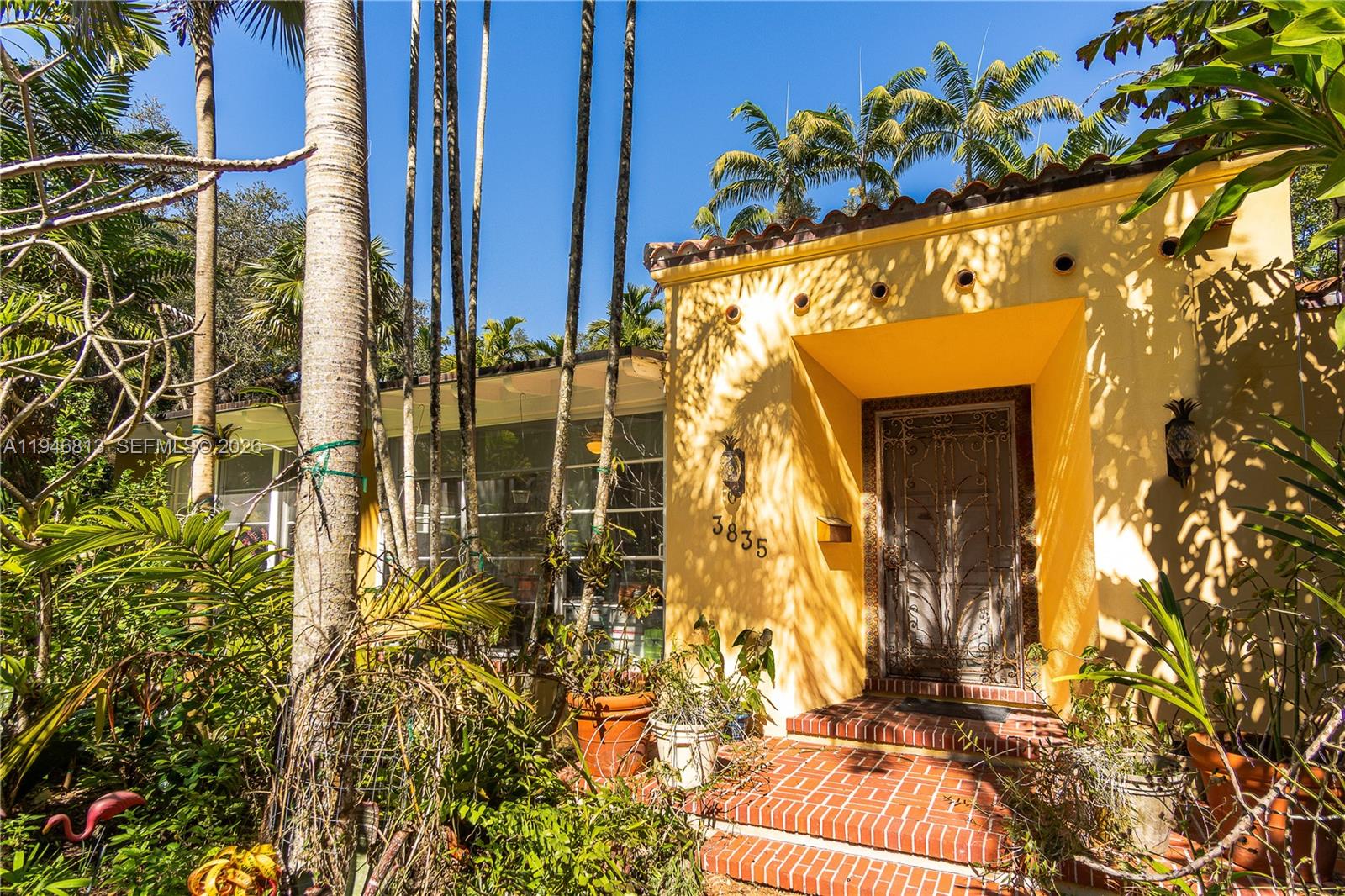 3835 Utopia Court Miami, FL 33133 - Photo 1 of 38 a view of front door