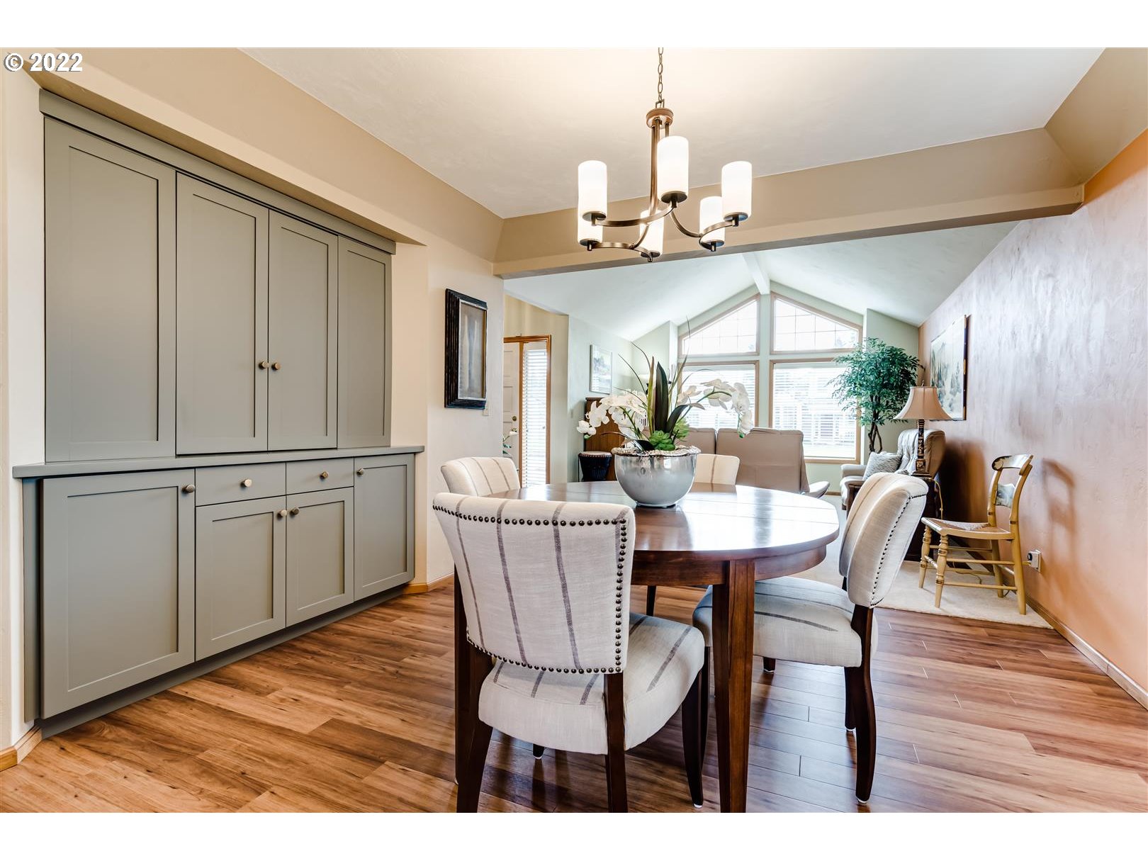 834 Raintree Way Springfield, OR 97477 - Photo 15 of 28 a view of a dining room with furniture and wooden floor