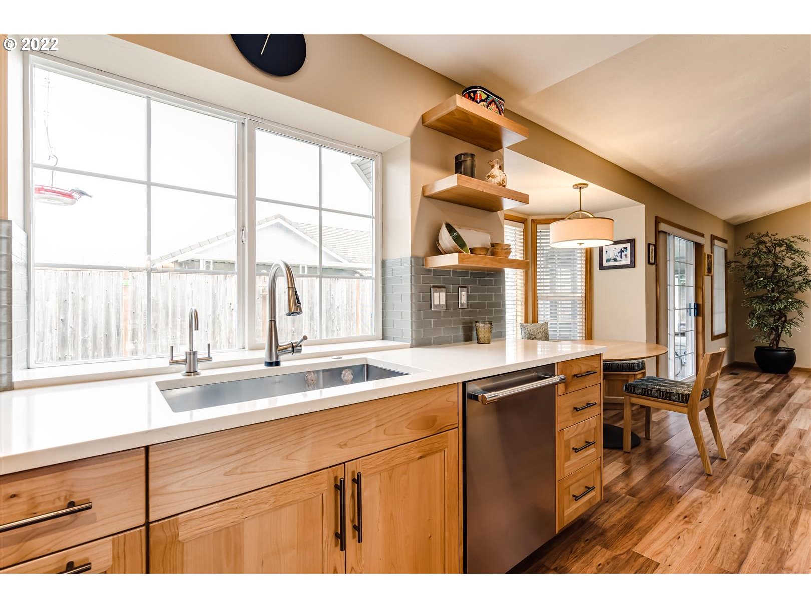 834 Raintree Way Springfield, OR 97477 - Photo 7 of 28 a kitchen with a sink and large window