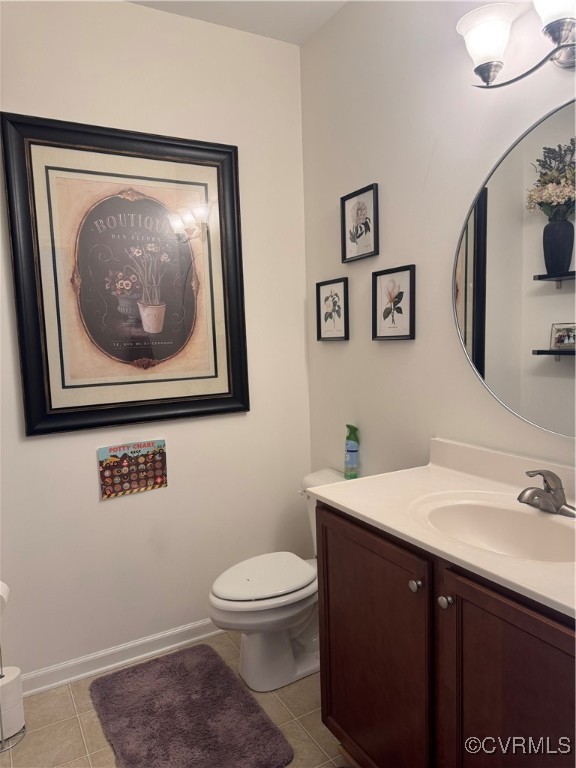 1802 Rustads Circle Williamsburg, VA 23188 - Photo 12 of 26 Bathroom with baseboards, vanity, tile patterned f