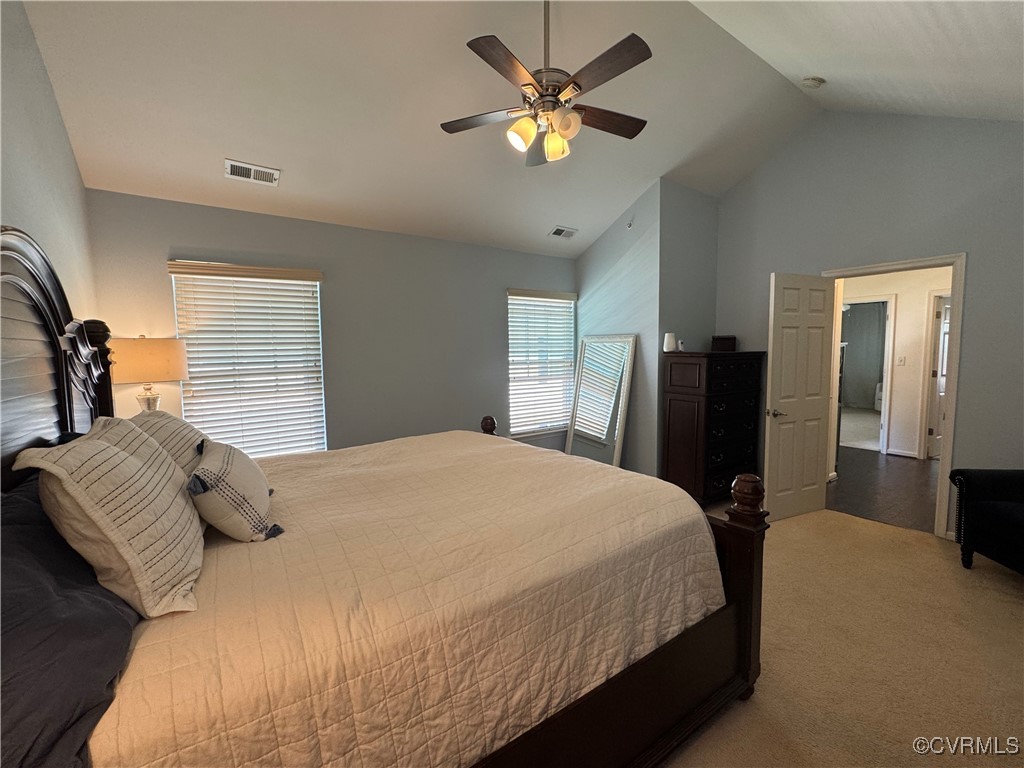 1802 Rustads Circle Williamsburg, VA 23188 - Photo 16 of 26 Carpeted bedroom featuring lofted ceiling, visible