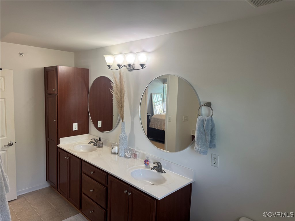 1802 Rustads Circle Williamsburg, VA 23188 - Photo 17 of 26 Full bathroom with tile patterned floors, a sink,