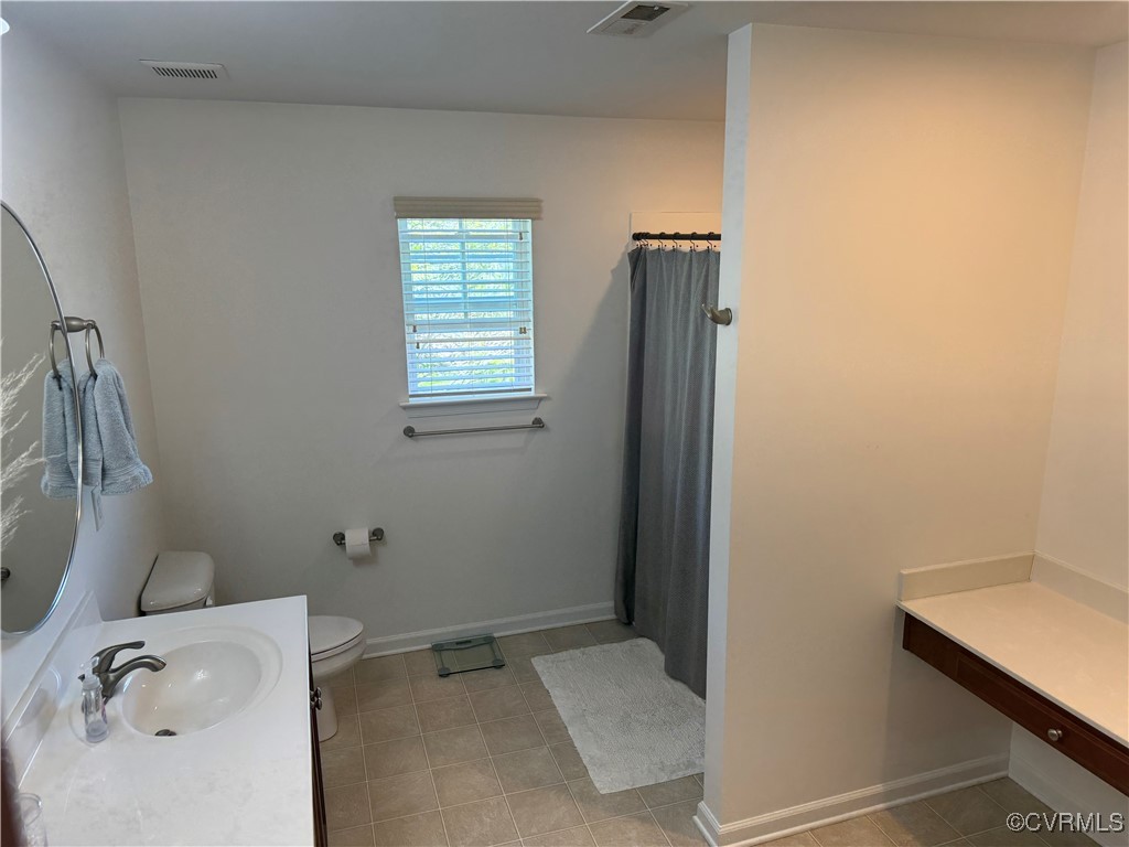 1802 Rustads Circle Williamsburg, VA 23188 - Photo 18 of 26 Bathroom with toilet, vanity, tile patterned floor