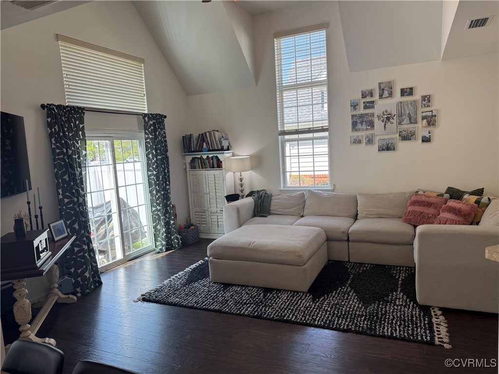 1802 Rustads Circle Williamsburg, VA 23188 - Photo 4 of 26 Living area with vaulted ceiling, wood finished fl
