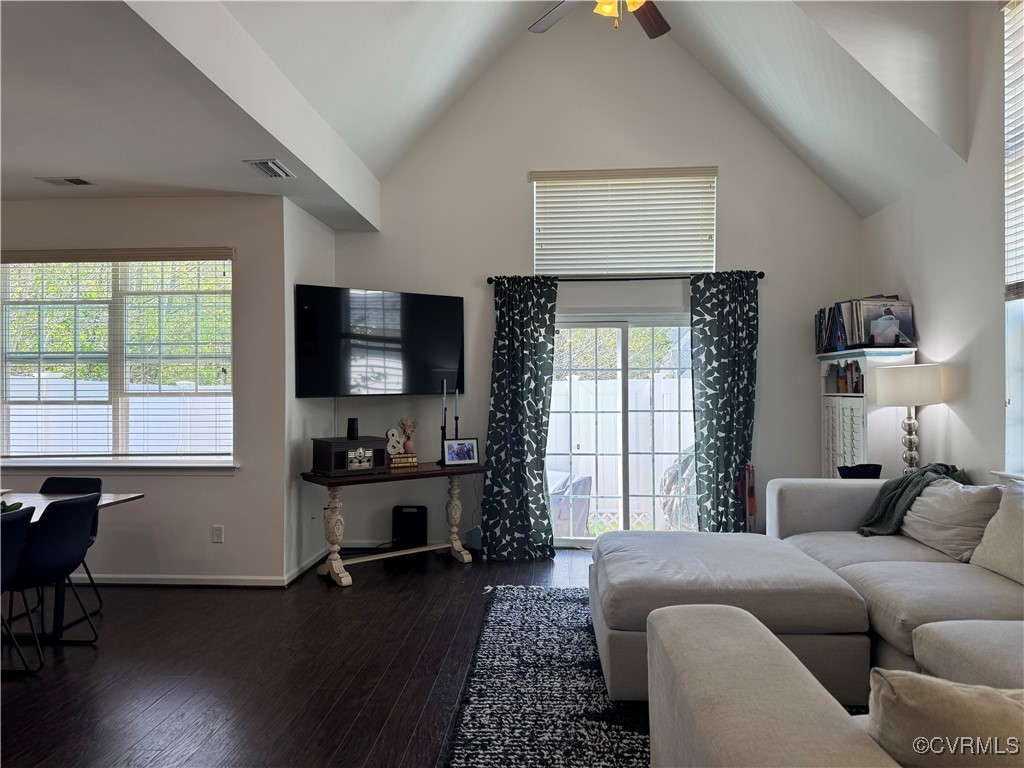 1802 Rustads Circle Williamsburg, VA 23188 - Photo 6 of 26 Living area featuring vaulted ceiling, visible ven