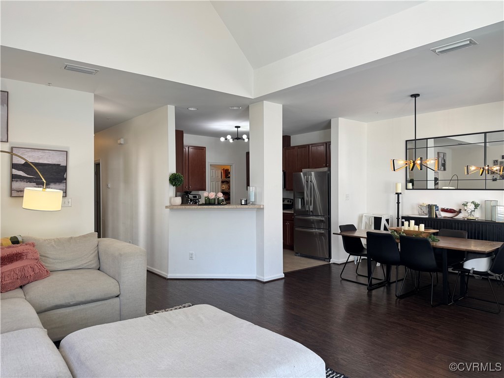 1802 Rustads Circle Williamsburg, VA 23188 - Photo 7 of 26 Living area with dark wood-style flooring, a notab