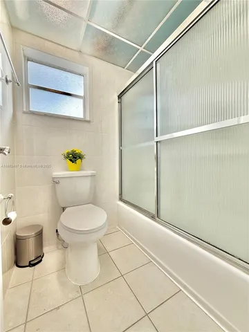 a front view of a house with garage