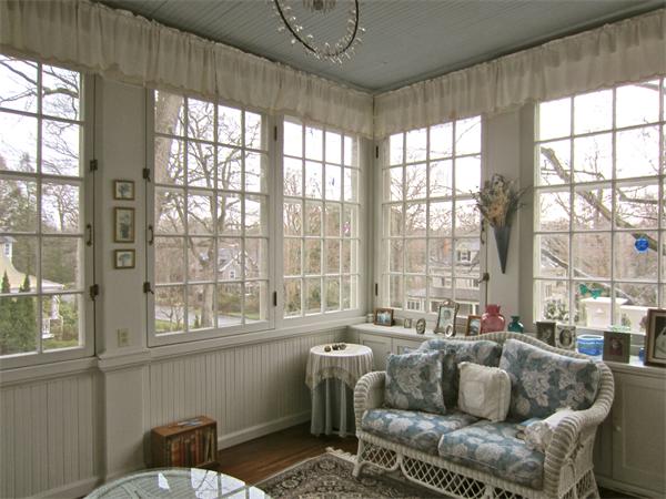 96 Abbott Road Wellesley, MA 02481 - Photo 10 of 14 a living room with furniture and a large window