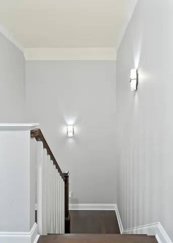 an aerial view of a house with swimming pool and garden view