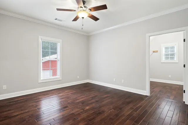 a playing room with furniture and a book shelf
