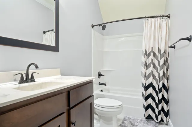 an outdoor space with pool and furniture