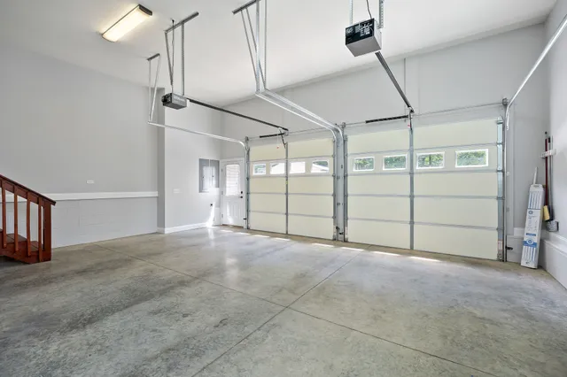 a view of house with backyard