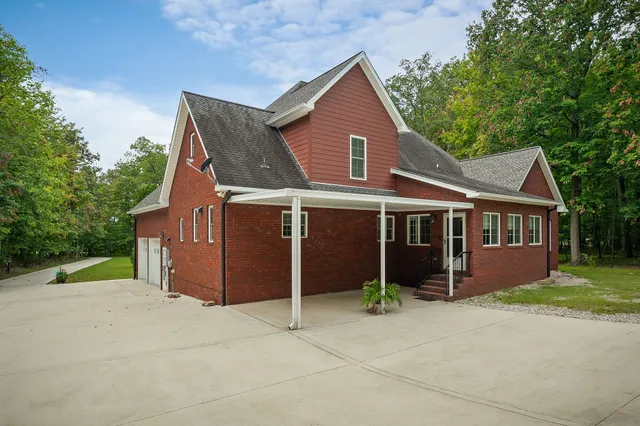 view of a house with a yard
