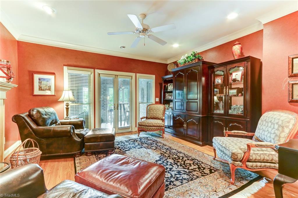6310 Hunt Road Pleasant Garden, NC 27313 - Photo 13 of 30 Functional luxury! Simple and unfussy Club Room or Study, but loaded with impact. Gas fireplace adds to that cozy feeling making you want to curl up with a good read!