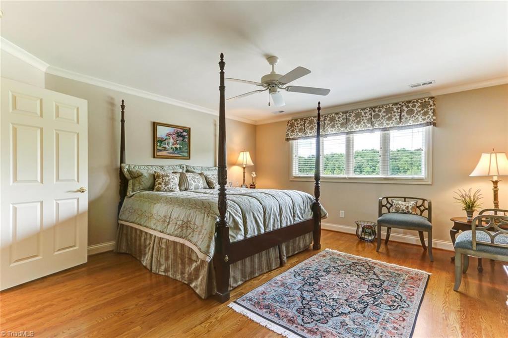 6310 Hunt Road Pleasant Garden, NC 27313 - Photo 19 of 30 Amazing views from all rooms add to the ambiance of this estate. Bedrooms are ensuite with walk in closets and hardwood flooring. Individuality is injected into each room.