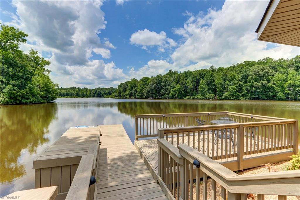 6310 Hunt Road Pleasant Garden, NC 27313 - Photo 22 of 30 Imagine a place you can lose yourself every day! Spring fed and loaded with fish (per owner)! Lighted dock with storage box for life vests, rafts, fishing rods or whatever! A totally peaceful retreat for family and friends.