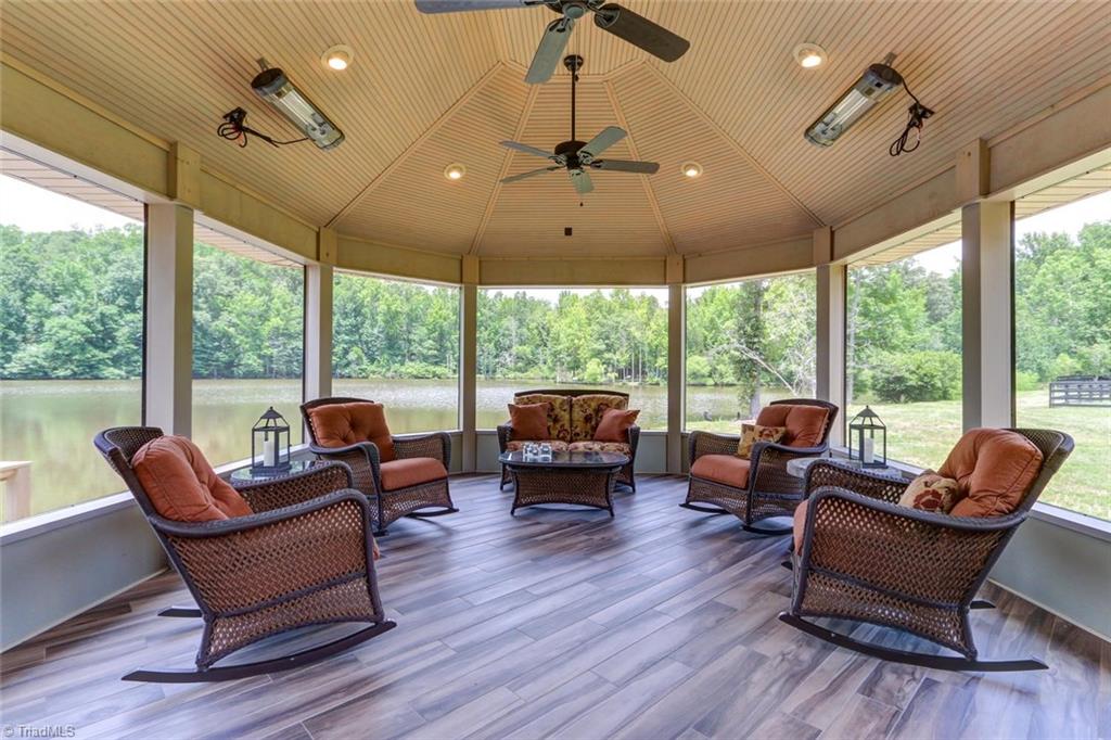 6310 Hunt Road Pleasant Garden, NC 27313 - Photo 23 of 30 The gazebo that adjoins the dock. Artfully designed and positioned for the views of both the lake, the residence and the pastures. Panoramic! Complete with beverage center, lights and the sounds of nature.