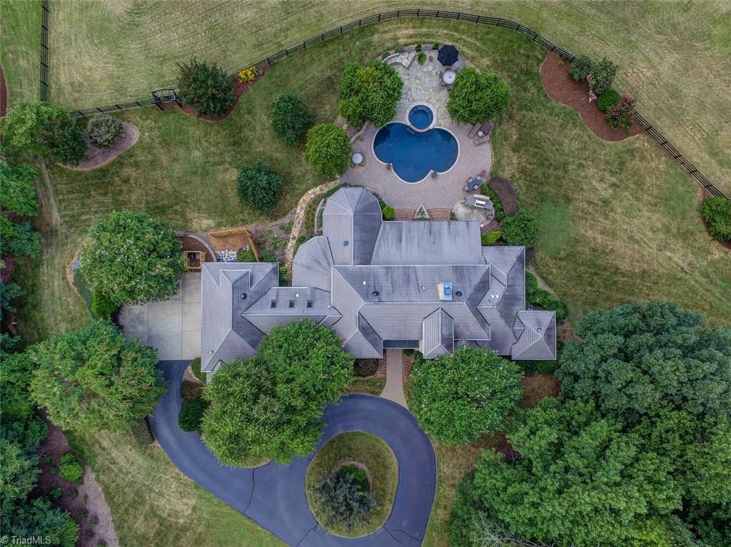 6310 Hunt Road Pleasant Garden, NC 27313 - Photo 28 of 30 This aerial view presents the property as a peaceful retreat nestled away .... from everything.