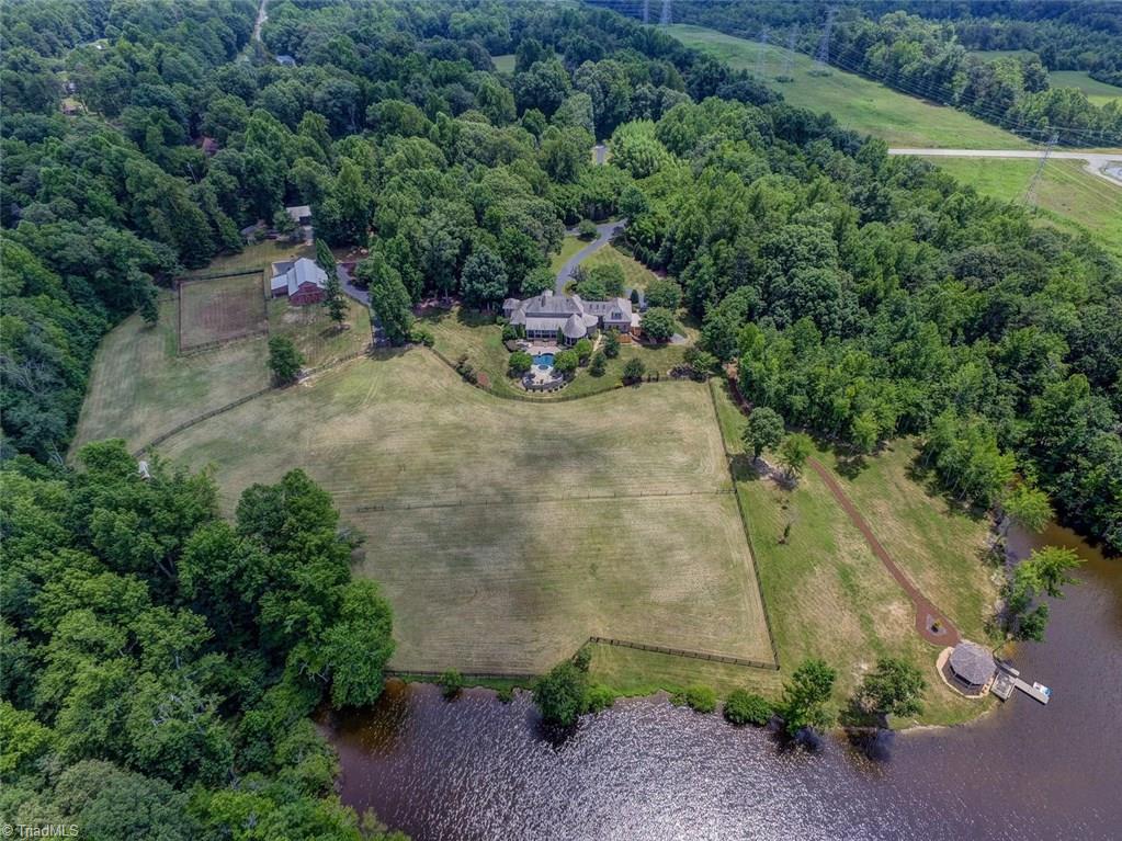 6310 Hunt Road Pleasant Garden, NC 27313 - Photo 29 of 30 The overview of the cultivated area. The residence cannot be seen from the road. Access is down a long paved winding drive through a Bamboo perimeter. The adjoining parcel is separately deeded.