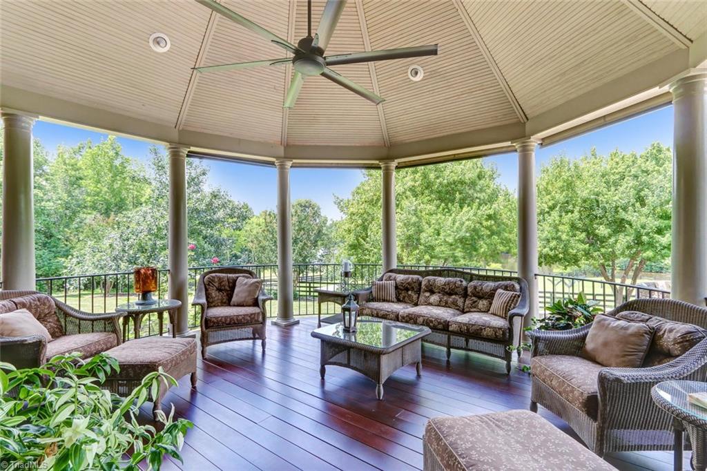 6310 Hunt Road Pleasant Garden, NC 27313 - Photo 4 of 30 A sanctuary within a sanctuary! The perfect spot to chase solitude. Enjoy the evening breeze overlooking the unobstructed panoramic views of your estate. Pull down shades for afternoon snoozing!