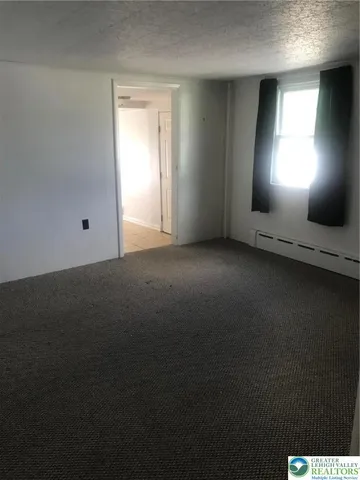 a bathroom with a toilet