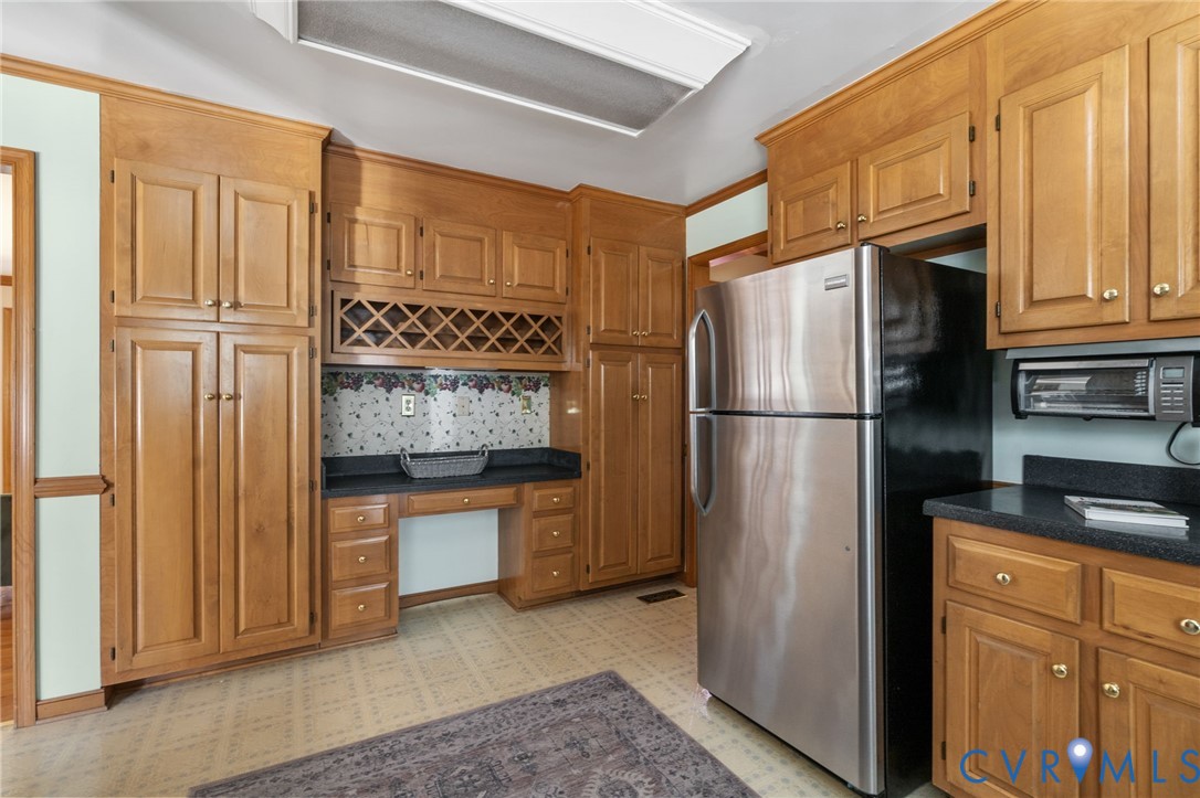 6420 Watchrun Drive Prince George, VA 23875 - Photo 12 of 42 Built in wine rack and coffee bar make entertainin