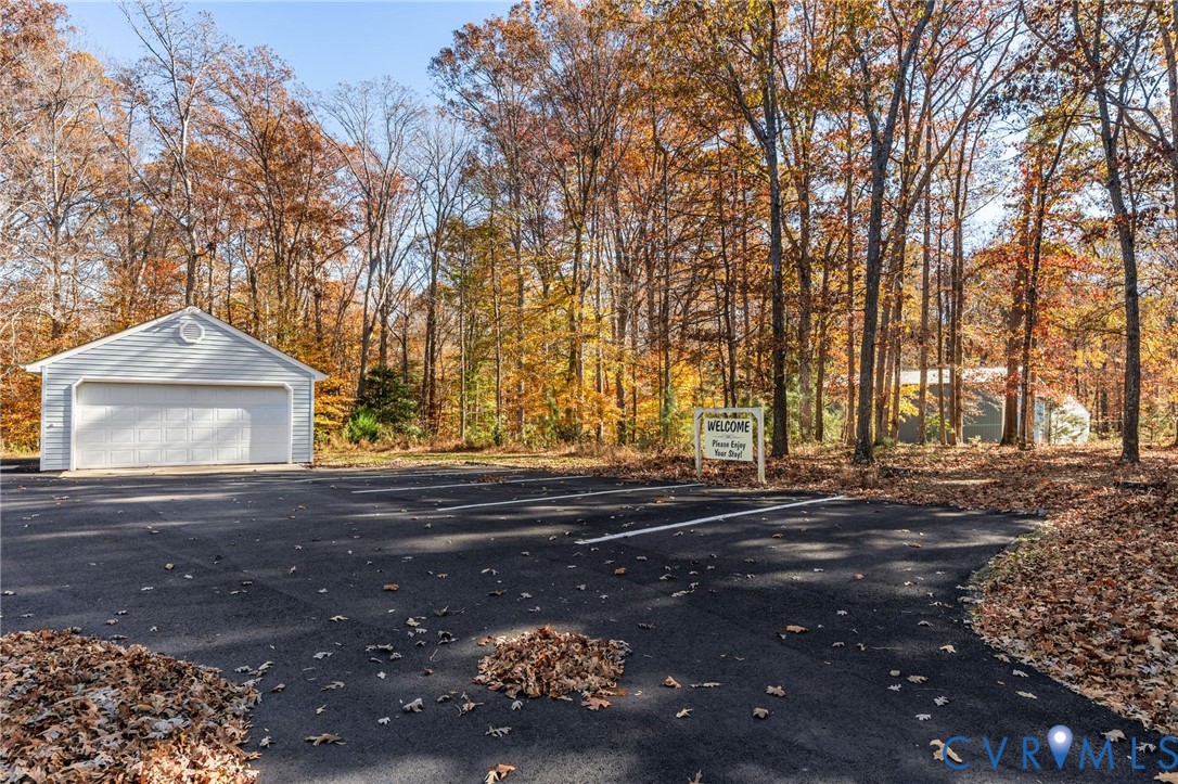 6420 Watchrun Drive Prince George, VA 23875 - Photo 35 of 42 Detached garage with tons of paved parking