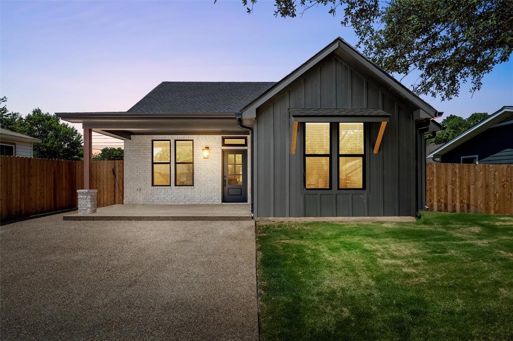 2923 Reuter Avenue Waco, TX 76708 - Photo 4 of 34 a front view of a house with a yard and garage
