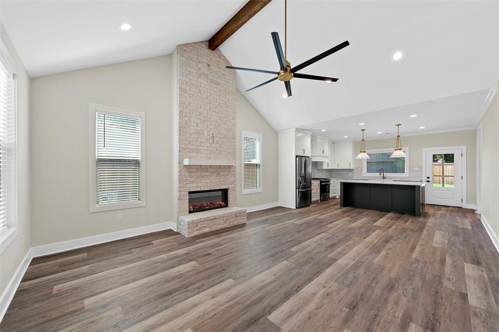 2923 Reuter Avenue Waco, TX 76708 - Photo 5 of 34 a view of kitchen and hall with wooden floor