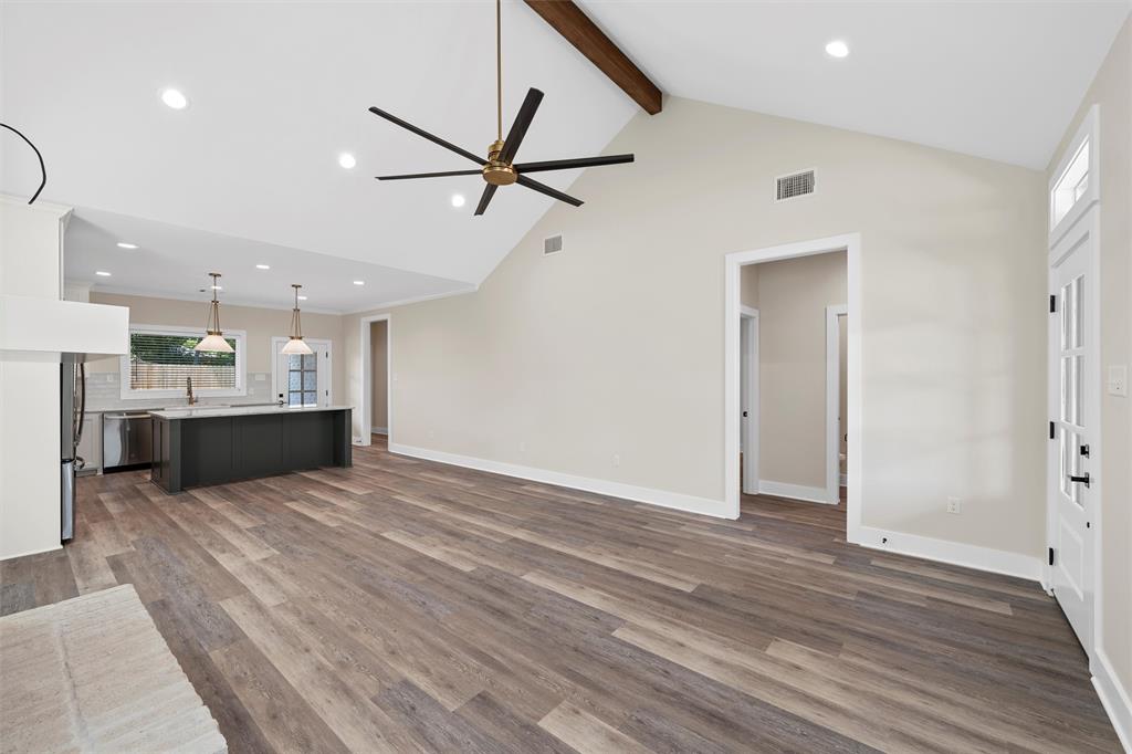 2923 Reuter Avenue Waco, TX 76708 - Photo 6 of 34 a view of a kitchen with a sink and a refrigerator