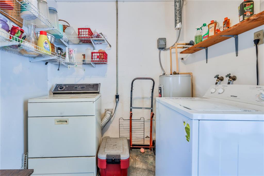6352 Spring Hill Drive Spring Hill, FL 34606 - Photo 25 of 35 a utility room with dryer and washer