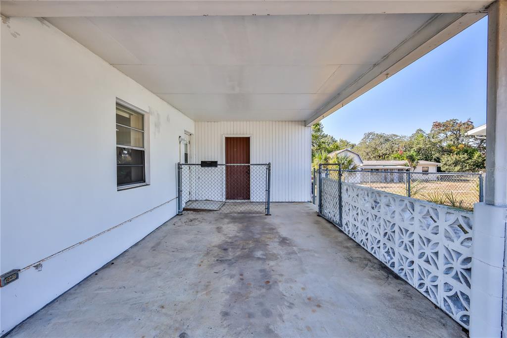 6352 Spring Hill Drive Spring Hill, FL 34606 - Photo 26 of 35 a view of a porch