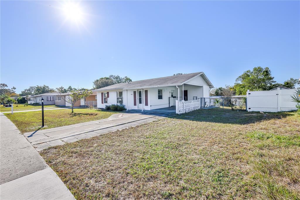 6352 Spring Hill Drive Spring Hill, FL 34606 - Photo 33 of 35 a view of house with a swimming pool