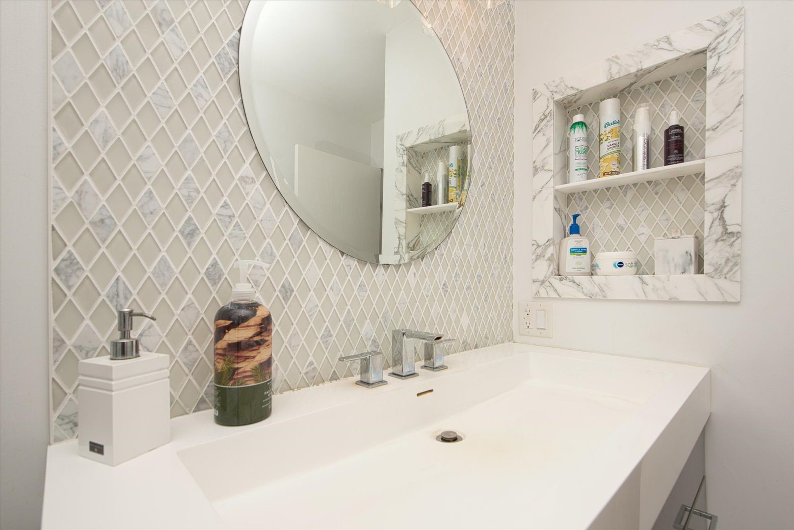 1196 Nottingham Lane Elgin, IL 60120 - Photo 38 of 45 a bathroom with a sink and a mirror