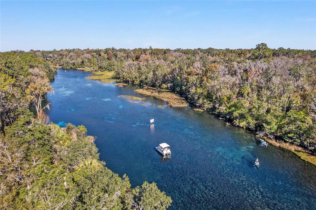 19231 Southwest 97th Street Dunnellon, FL 34432 - Photo 28 of 31 a view of a houses with a mountain