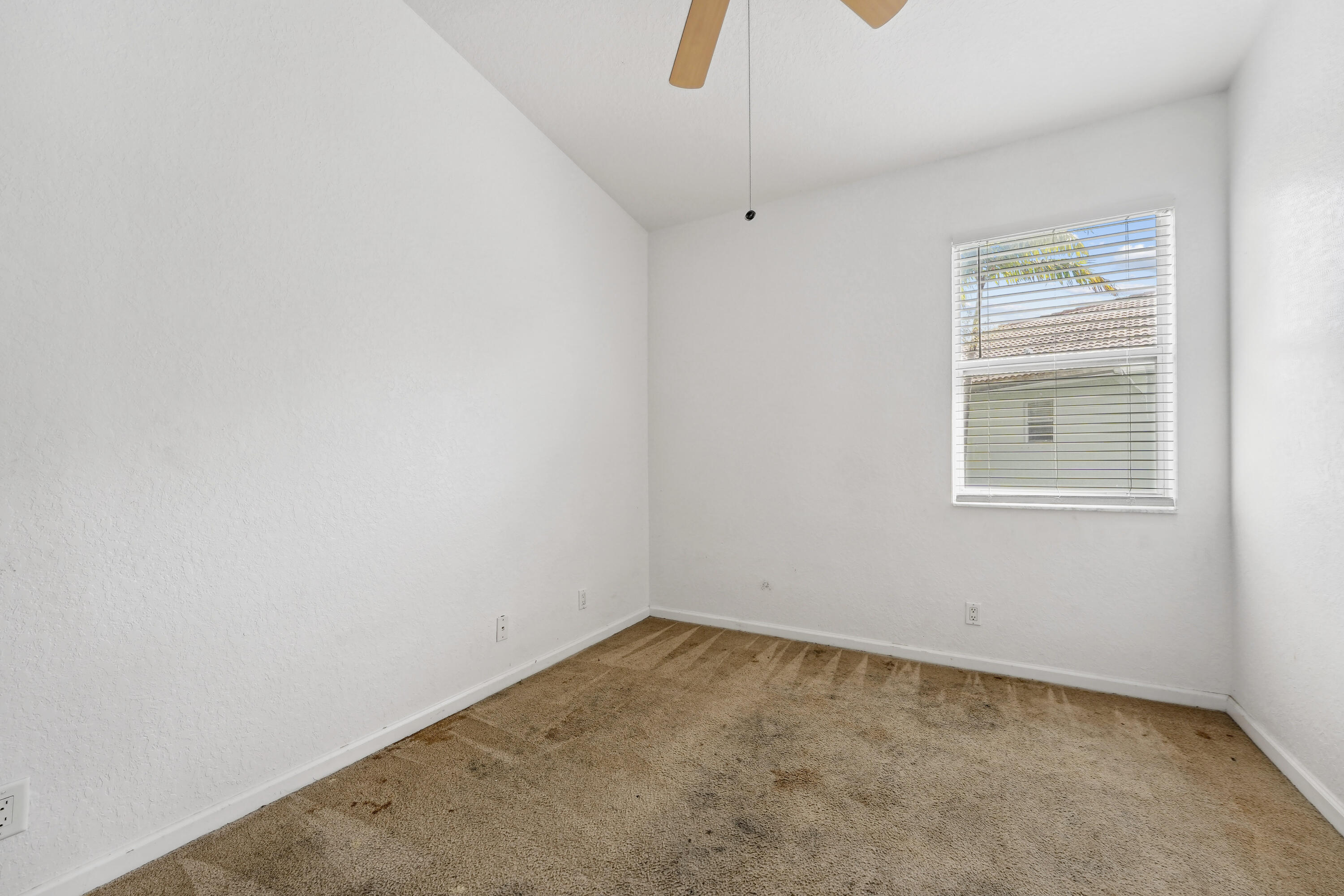 3258 Laurel Ridge Circle Riviera Beach, FL 33404 - Photo 17 of 27 Second Bedroom
