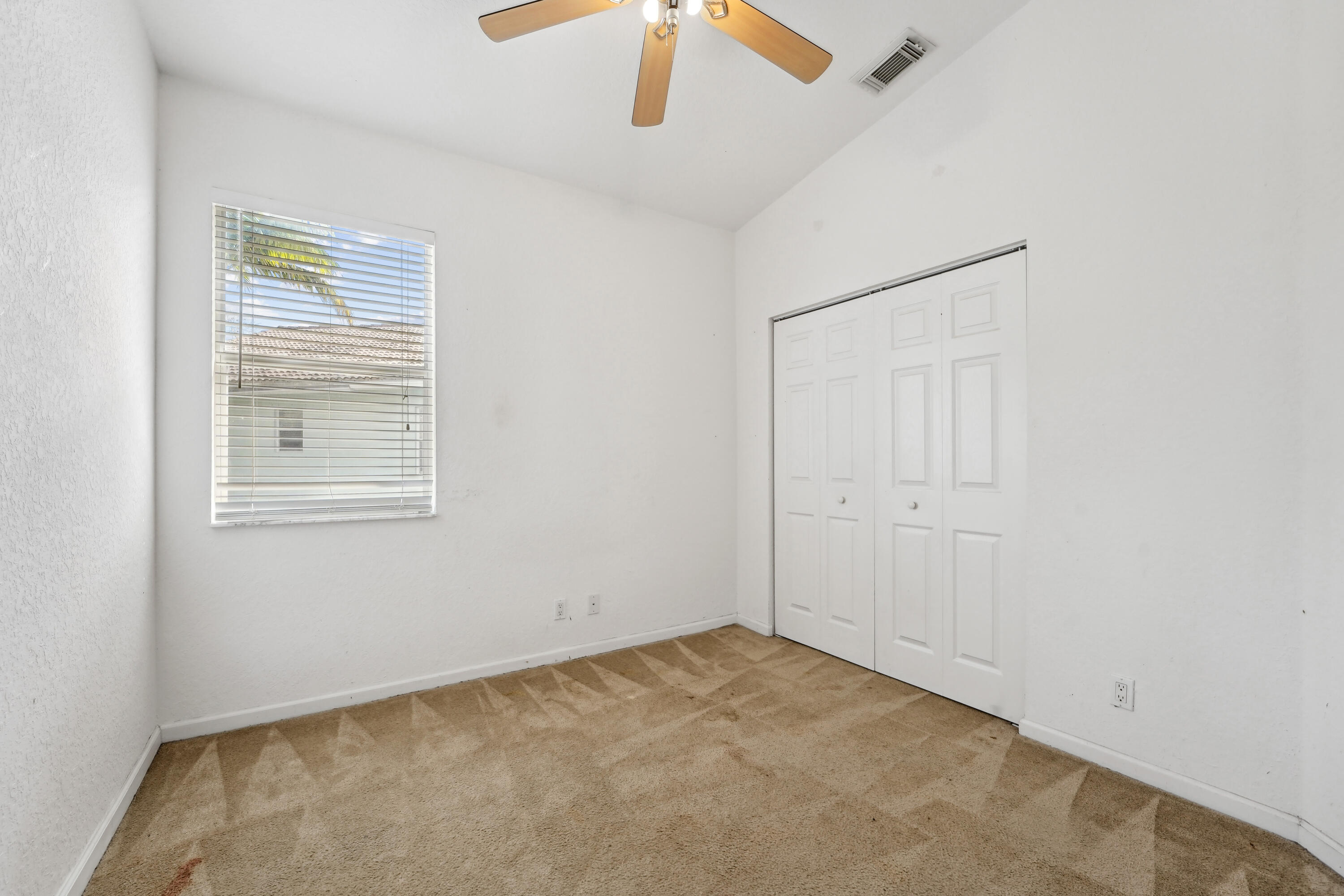 3258 Laurel Ridge Circle Riviera Beach, FL 33404 - Photo 18 of 27 Third Bedroom