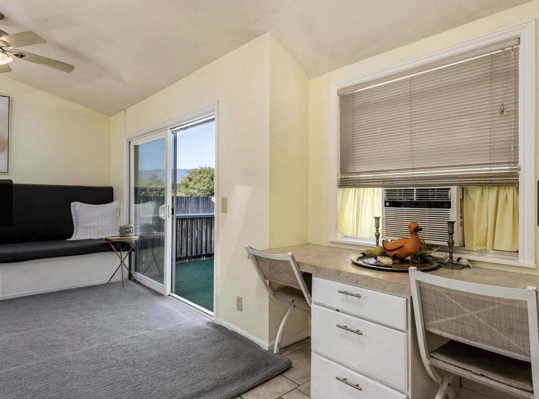 4156 Vista Clara Road Santa Barbara, CA 93110 - Photo 25 of 36 a living room with furniture and a large window