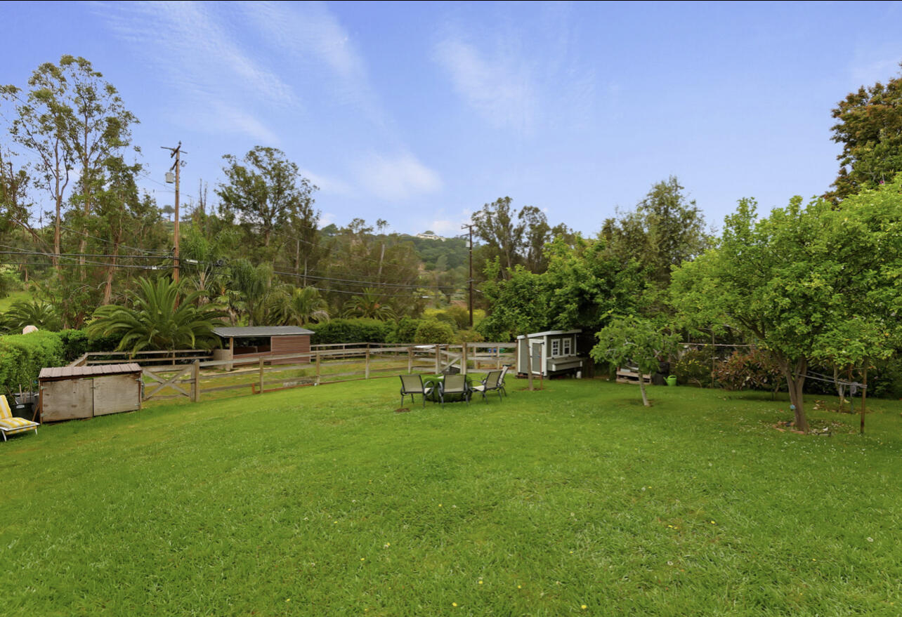 4156 Vista Clara Road Santa Barbara, CA 93110 - Photo 3 of 36 a view of a swimming pool with a yard