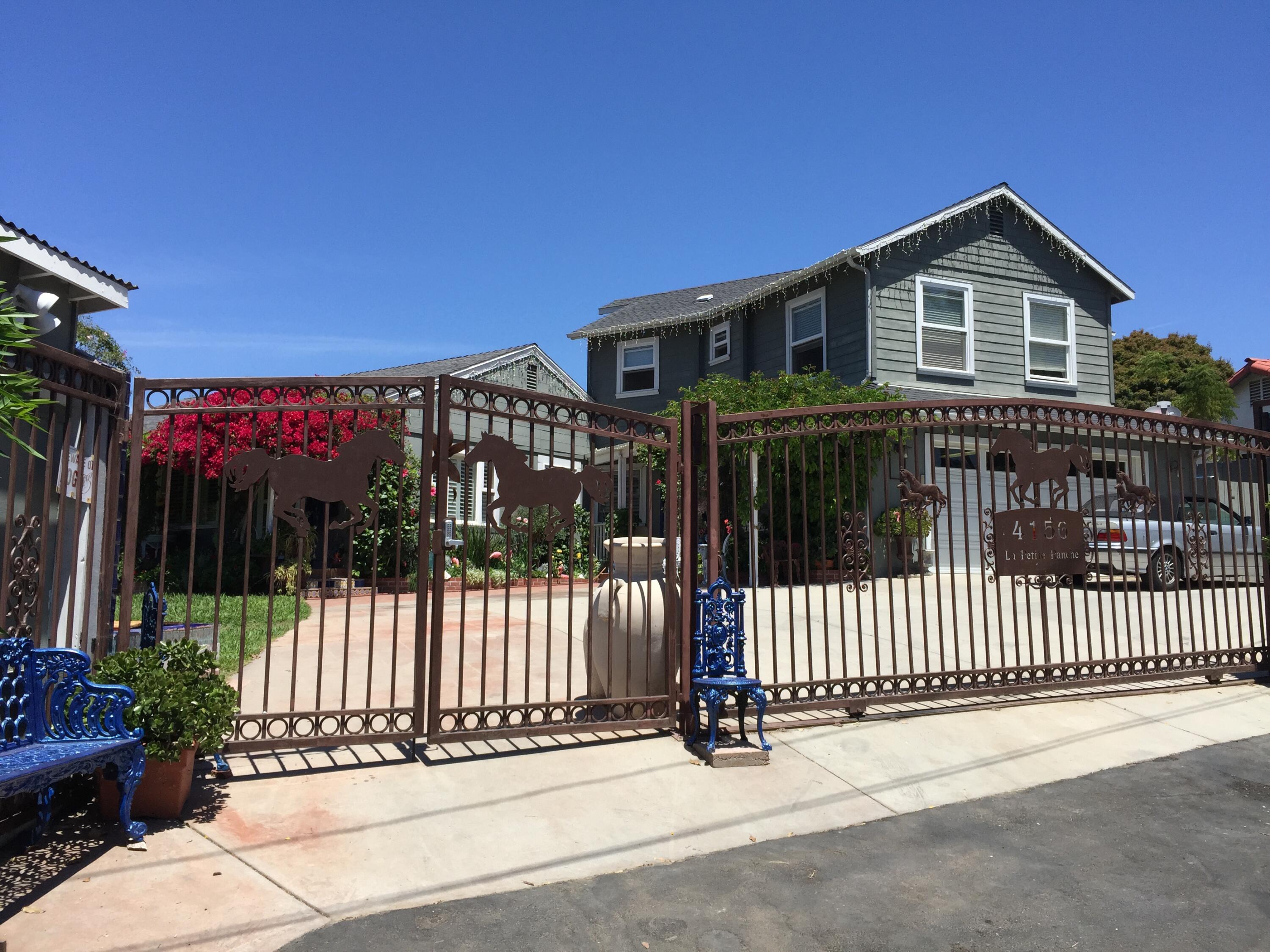 4156 Vista Clara Road Santa Barbara, CA 93110 - Photo 36 of 36 a view of a house with a small yard and wooden fence