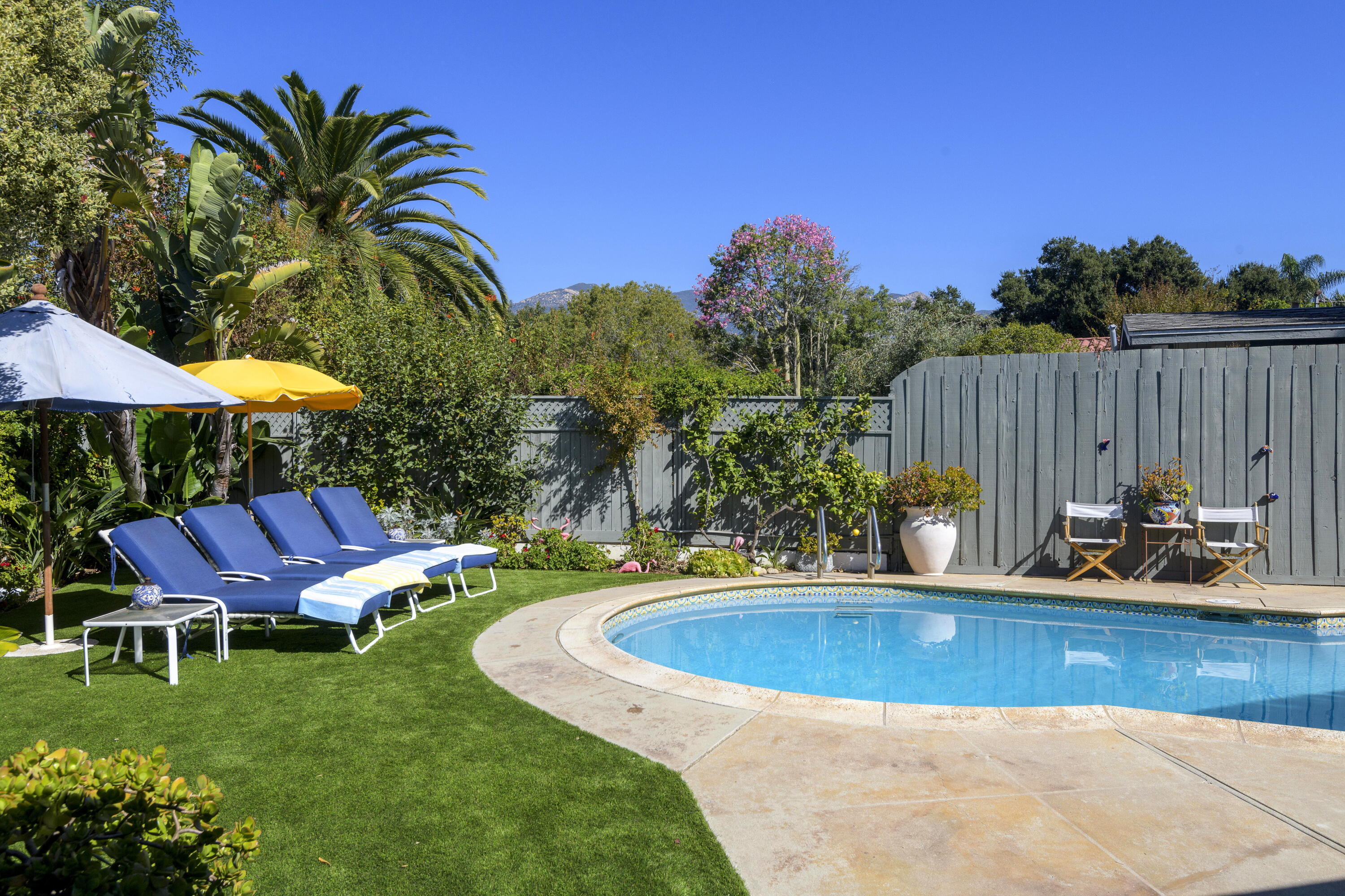 4156 Vista Clara Road Santa Barbara, CA 93110 - Photo 7 of 36 a view of a backyard with a tub and chairs