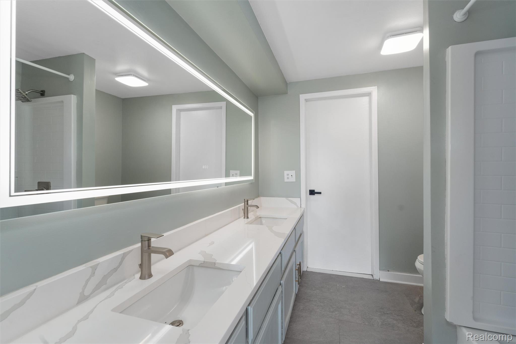32105 West 12 Mile Road Farmington, MI 48334 - Photo 25 of 39 Bathroom with shower / bathtub combination and double vanity